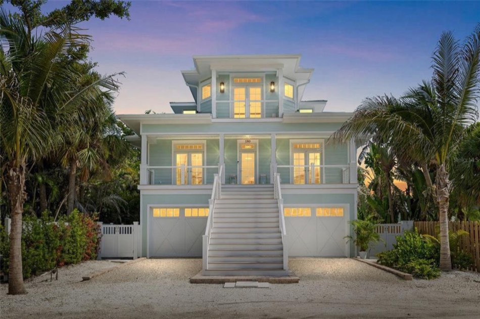 Luxury Sarasota home painted by MJD Coastal Services at dusk
